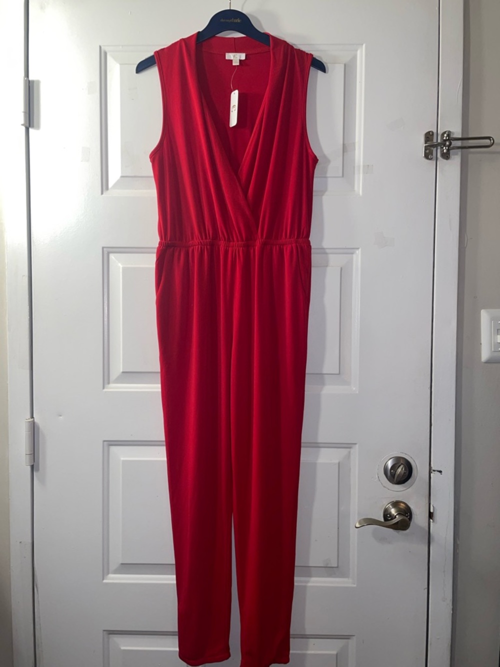 Charming Charlie Red Sleeveless V-Neck Jumpsuit. New with Tags